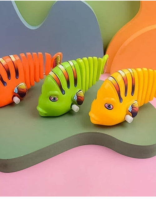 Load image into Gallery viewer, Wind-Up Wiggle Fish Toys
