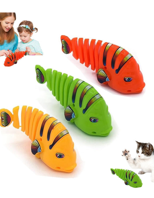 Load image into Gallery viewer, Wind-Up Wiggle Fish Toys
