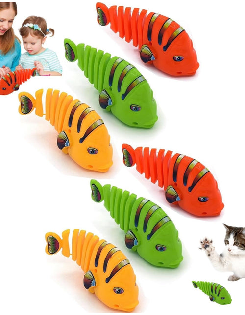 Load image into Gallery viewer, Wind-Up Wiggle Fish Toys
